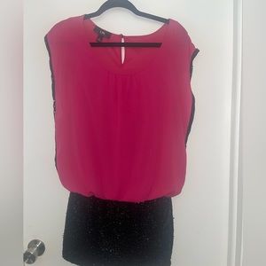 Short 2 toned dress. Hot pink on top and black sequence bottom